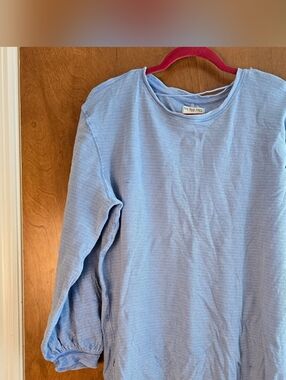 This light blue, textured top is from the We The Free collection by Free People.